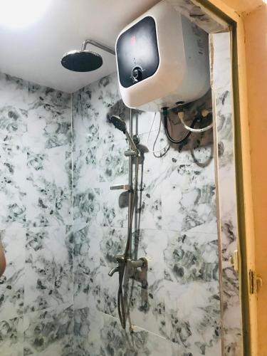 TV a/nebo společenská místnost v ubytování Umbrella properties - Eleyele Ibadan