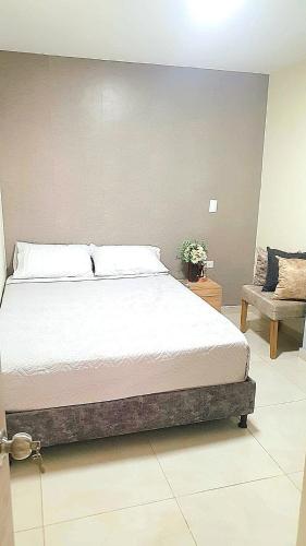 Voodi või voodid majutusasutuse Acogedor ApartaStudio Zona Centro toas