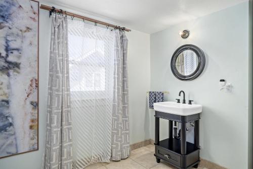 a bathroom with a sink and a shower curtain at The Wesley Walla Walla in Walla Walla