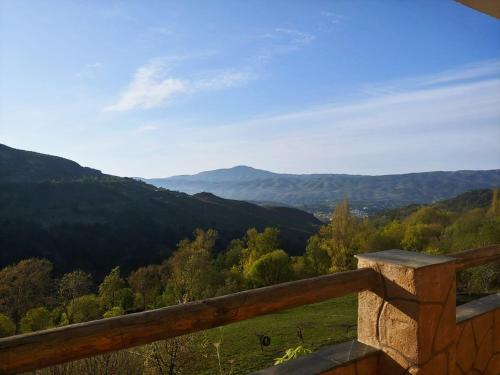a view of the mountains from the balcony of a house at Turismo Rural & SPA El Cercado in Bérchules