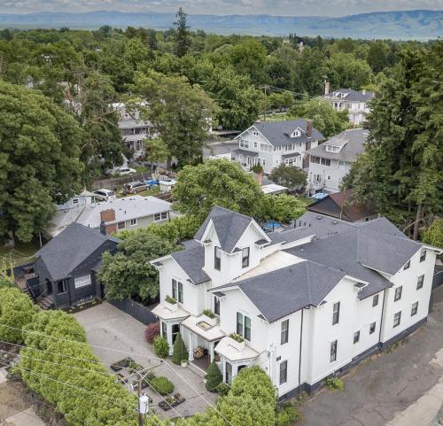 an aerial view of a large white house at The Wesley Walla Walla in Walla Walla