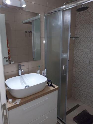 Renovated apartment with garden and parking space