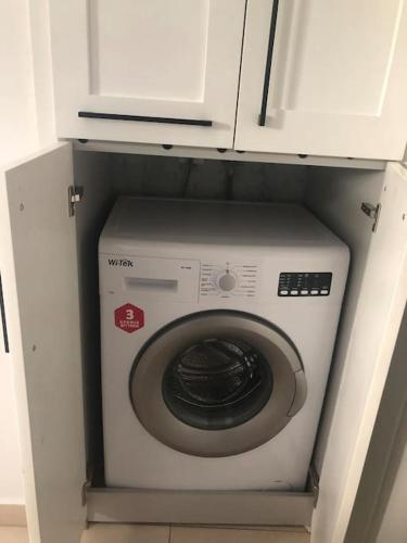 Renovated apartment with garden and parking space