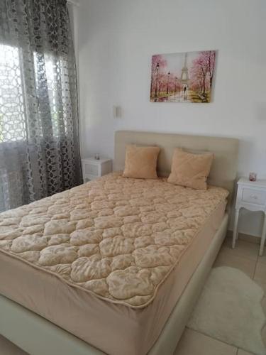 Renovated apartment with garden and parking space