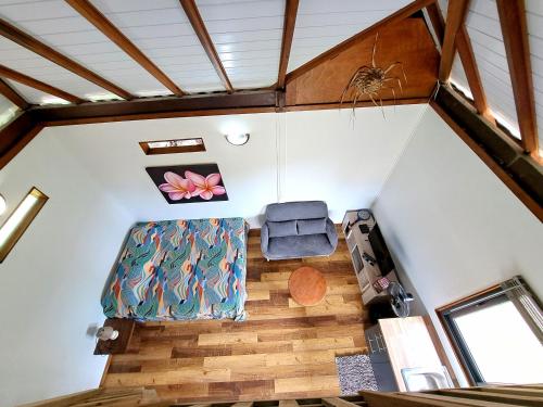 an overhead view of the living room of a tiny house at MOOREA - Bungalow Moekea Lagoon in Hauru