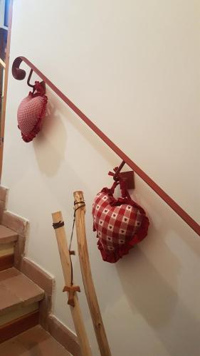 a lamp on the side of a stairs with a ball on it at Casa Ernesto-AMICA DEI CICLISTI in Acquasparta