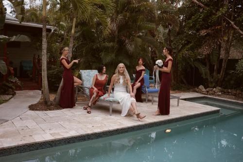 a group of women sitting around a pool at Manatee Palms in Bradenton