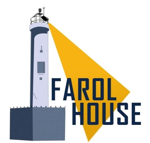 d'un phare avec la salle de cri écrite à côté dans l'établissement Farol House, à Maricá