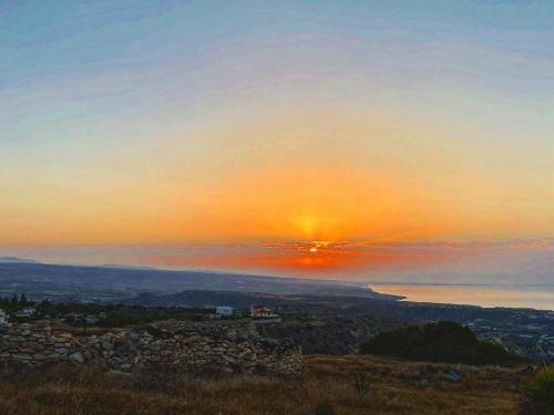 a sunset from the top of a hill at Chariandry Court in Pissouri