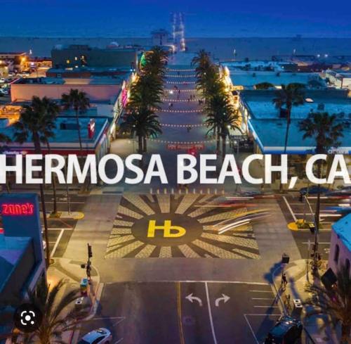 a sign that reads thermosa beach car in a parking lot at SouthBAY Beaches Beauty&Cozy Apt in Gardena