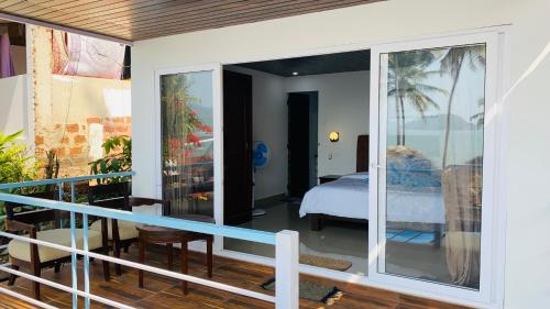 Ένα ή περισσότερα κρεβάτια σε δωμάτιο στο Grand Sea Shades Goa