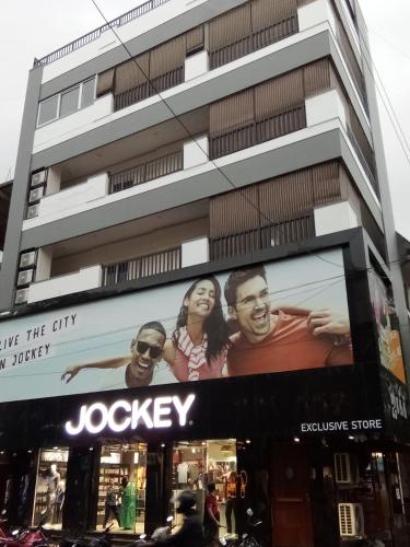a building with an advertisement on the side of it at Casa Mel in Puducherry