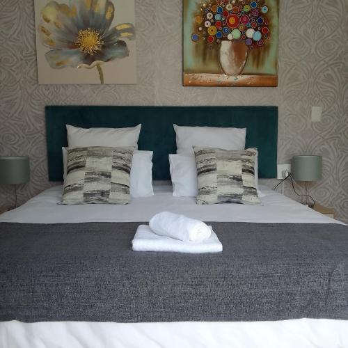 Postel nebo postele na pokoji v ubytování Naliya Guest house