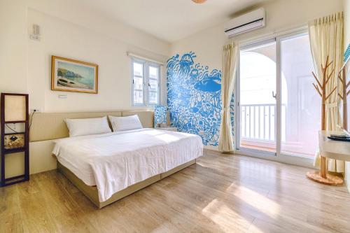Postel nebo postele na pokoji v ubytování Island Arch Homestay