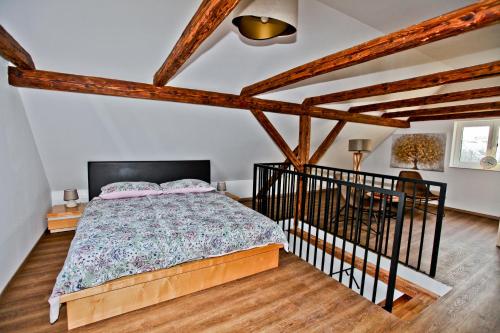 מיטה או מיטות בחדר ב-Vila Loni