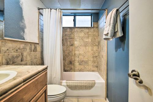 a bathroom with a tub and a toilet and a sink at Santa Monica Townhome - Close to Beach! in Los Angeles