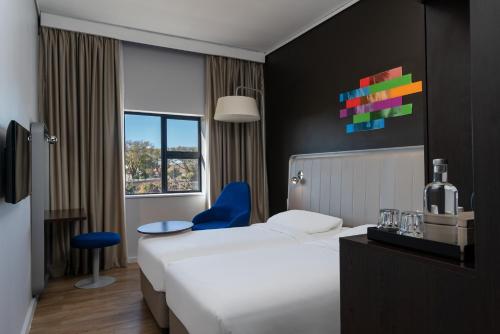 Una cama o camas en una habitación de Park Inn by Radisson Polokwane