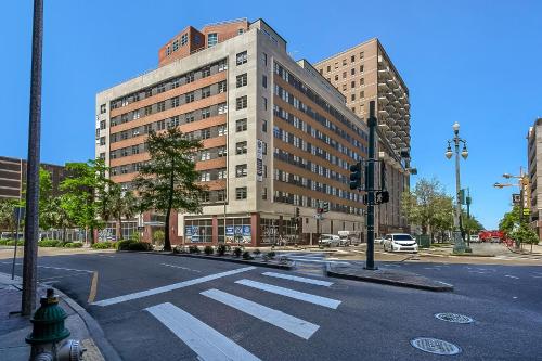 an intersection with a large building on a city street at Tasteful Condo Walking Distance to French Quarter in New Orleans