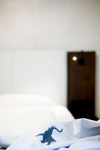 Katil atau katil-katil dalam bilik di Hotel Elefant