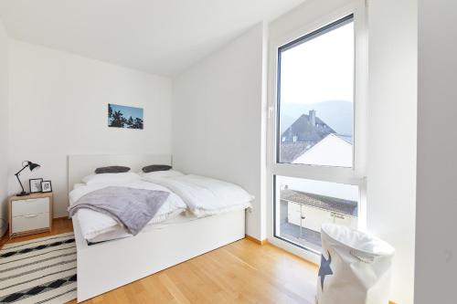 Postel nebo postele na pokoji v ubytování Daheim & Unterwegs