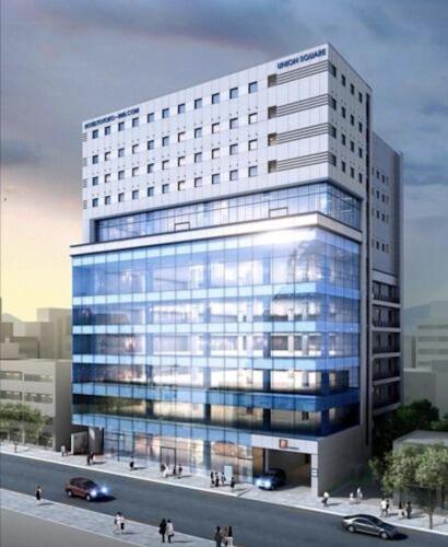 a rendering of a tall building with people walking in front of it at Toyoko Inn Daegu Dongseongro in Daegu