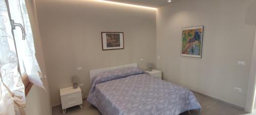 Postel nebo postele na pokoji v ubytování Valdisieve Guest House Appartamento 20 minuti da Firenze