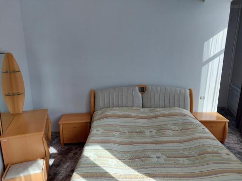 Ein Bett oder Betten in einem Zimmer der Unterkunft University Hotel Tsakhkadzor