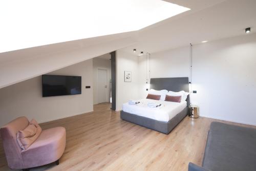 Postel nebo postele na pokoji v ubytování San Carlo Suite Torino