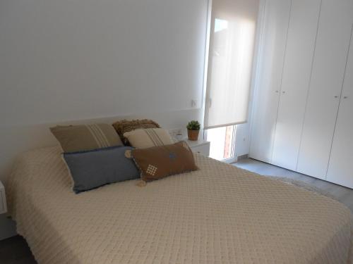Ένα ή περισσότερα κρεβάτια σε δωμάτιο στο Luxury Apartment Cambrils