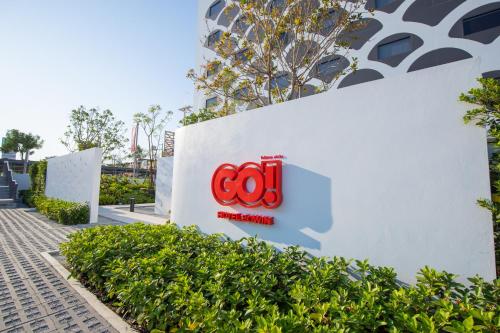 a sign for a cebu international building at GO Hotel Bowin at Robinson Lifestyle Bowin in Si Racha
