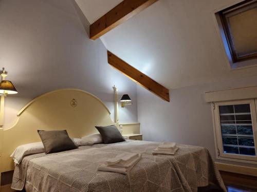 Postel nebo postele na pokoji v ubytování Hotel Harrison Etxea