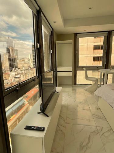 1 dormitorio con vistas a la ciudad en Hermoso departamento, increible vista. en Buenos Aires