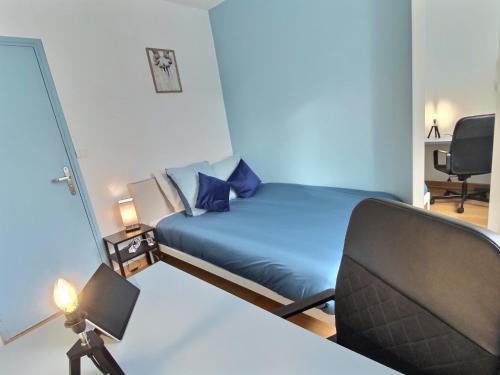 Postel nebo postele na pokoji v ubytování Charmant T3 Centre ville - Cozy Houses
