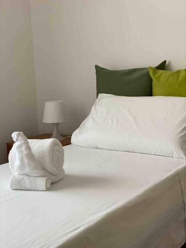 Katil atau katil-katil dalam bilik di The Green House Suite & Apartment