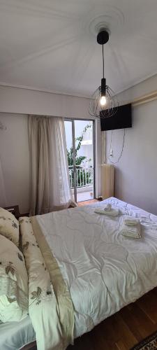 Ліжко або ліжка в номері A peaceful apartment in Athens