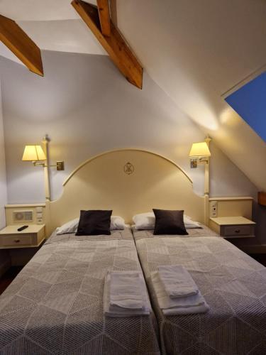 Postel nebo postele na pokoji v ubytování Hotel Harrison Etxea