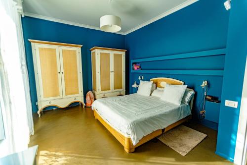Postel nebo postele na pokoji v ubytování Casa Morgana
