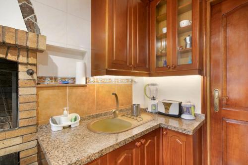 a kitchen with a sink and a counter top at Estudio Mario in La Laguna