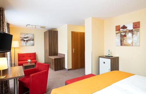 TV a/nebo společenská místnost v ubytování Hotel-Residenz Immenhof