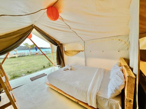 Postel nebo postele na pokoji v ubytování Diamond Glamping by BIO Management