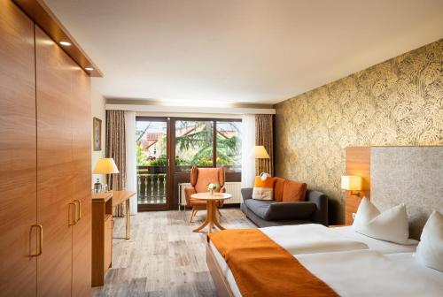 Postel nebo postele na pokoji v ubytování Hotel-Residenz Immenhof