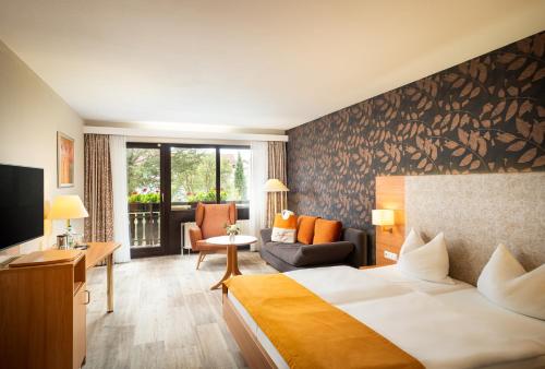 Postel nebo postele na pokoji v ubytování Hotel-Residenz Immenhof