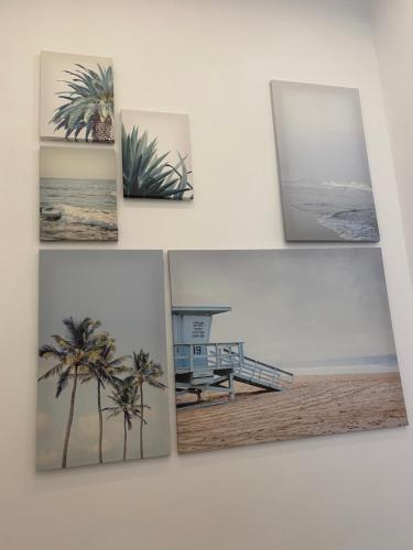 four pictures of a beach with palm trees and a house at Aquae Stays in St Paul's Bay