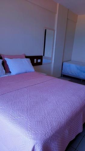 Cama o camas de una habitación en FLAT COM VISTA PARA O MAR - Cond Ayambra Residencial