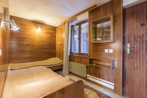 a room with two beds and a window at Apartment Alenka in Novigrad Istria