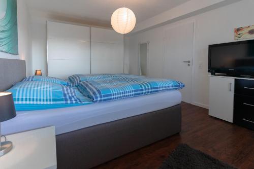 Katil atau katil-katil dalam bilik di Ferienwohnung Offermann