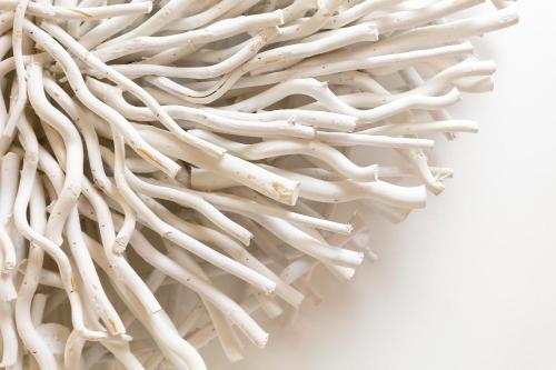 a pile of white wood on a white background at Whitstable Wishes, a Stylish Seaside Retreat, Whitstable with Parking Space in Whitstable