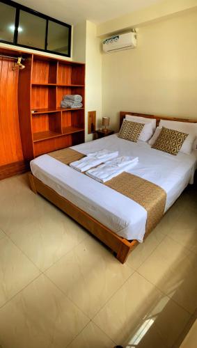 Studio 69 Aparthotelにあるベッド