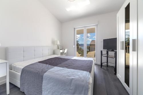 Ένα ή περισσότερα κρεβάτια σε δωμάτιο στο Villa Bamboo