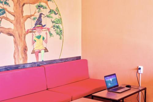 Televisor o centre d'entreteniment de Meiga Backpackers Hostel